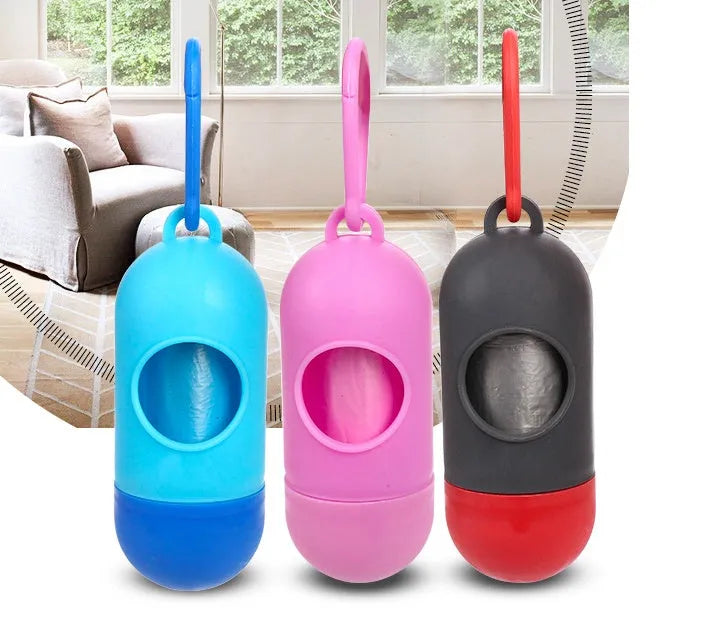 Roll of coloured dog waste bags showing black, blue, green, and pink options