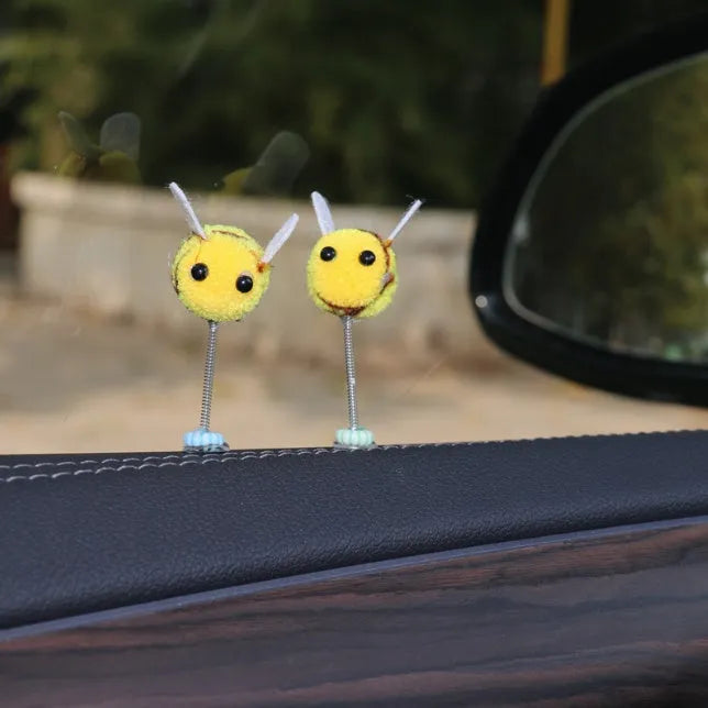 Swing Spring Bee car decoration ornament with cartoon design measuring 3x3 cm