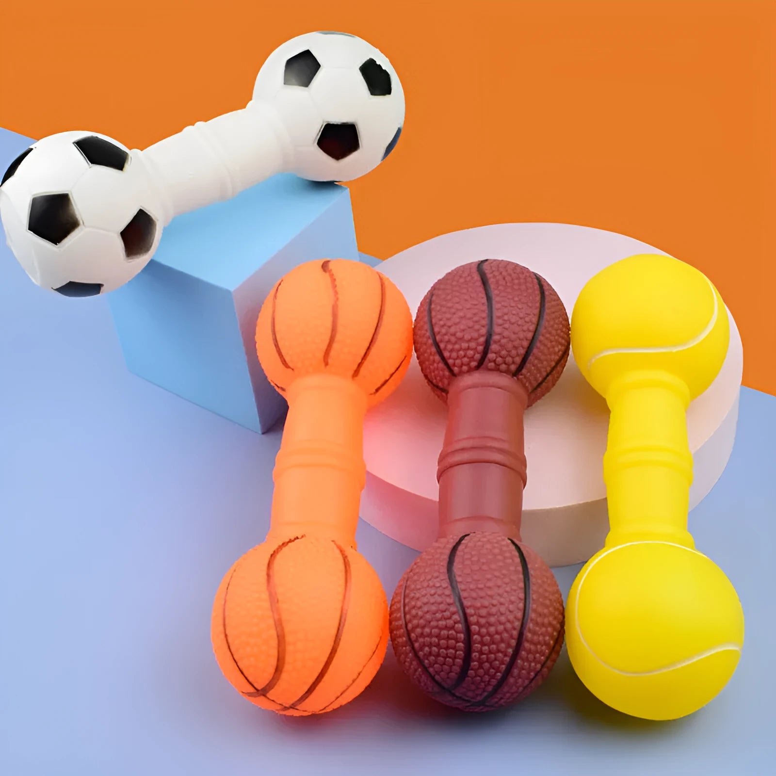 Four coloured brown, orange, white, yellow dumbbell shaped squeaky football dog toys.