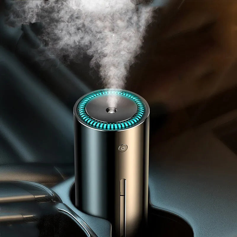 Black aluminium alloy car diffuser humidifier with USB cable on a car dashboard