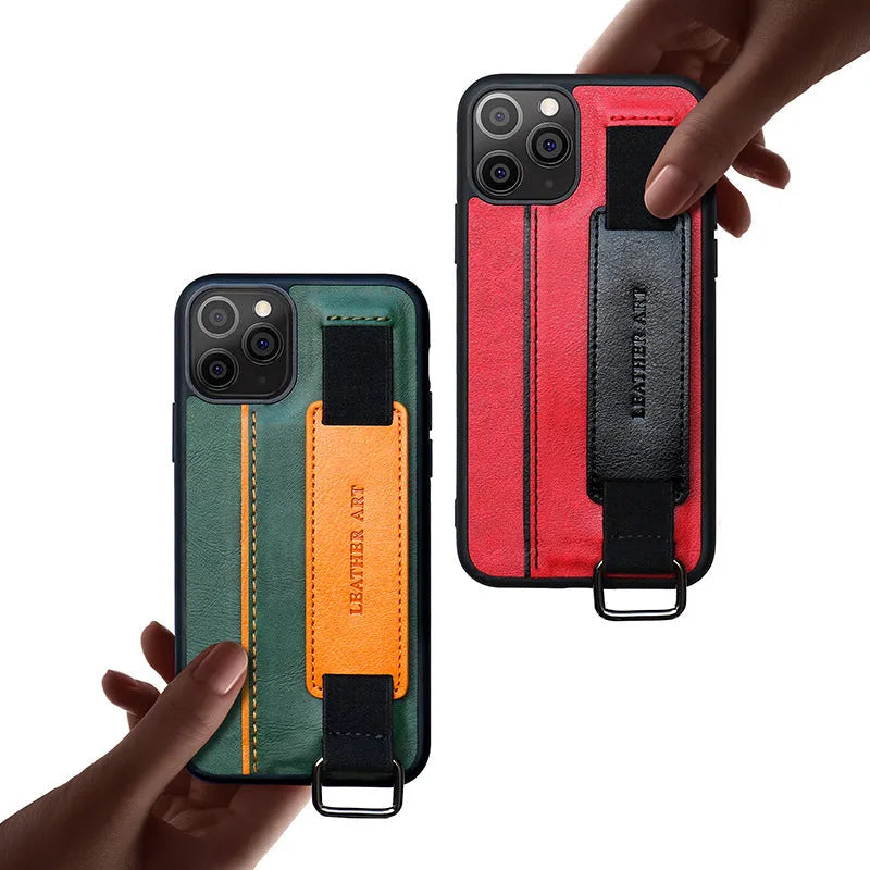 Brown imitation leather iPhone case with wrist strap showing striped pattern and decorative stitching