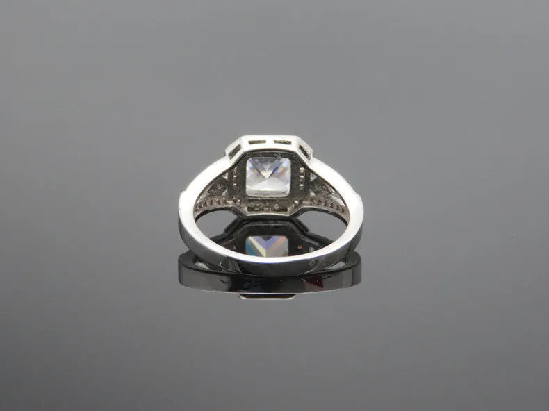 Platinum colour geometric women's ring with hollow design and inlaid zircon stones