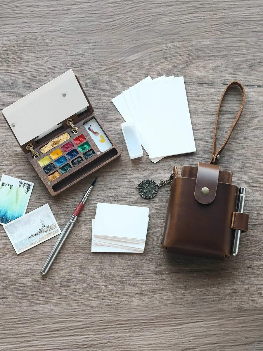 Mini walnut wood watercolour paint box with basic artist pigments and portable design