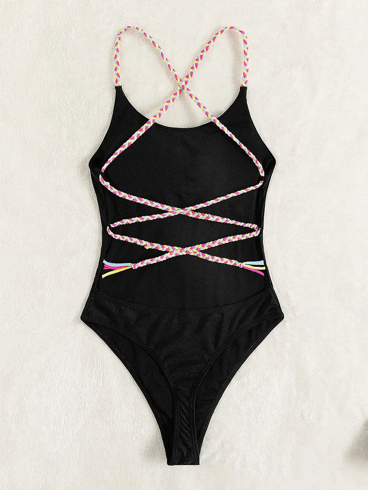 Black backless one-piece swimsuit for women with sleeveless design and solid colour