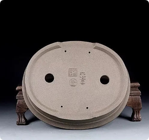 Handmade antique oval bonsai flower pot in purple sand clay, showing dimensions.