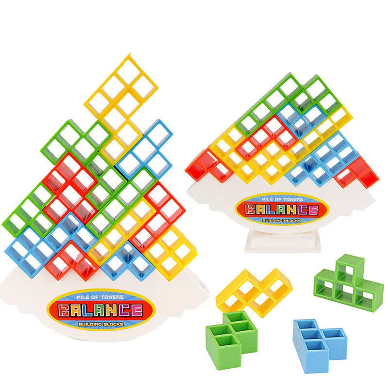 Plastic balance stacking board game with colourful blocks, chassis, and base on table