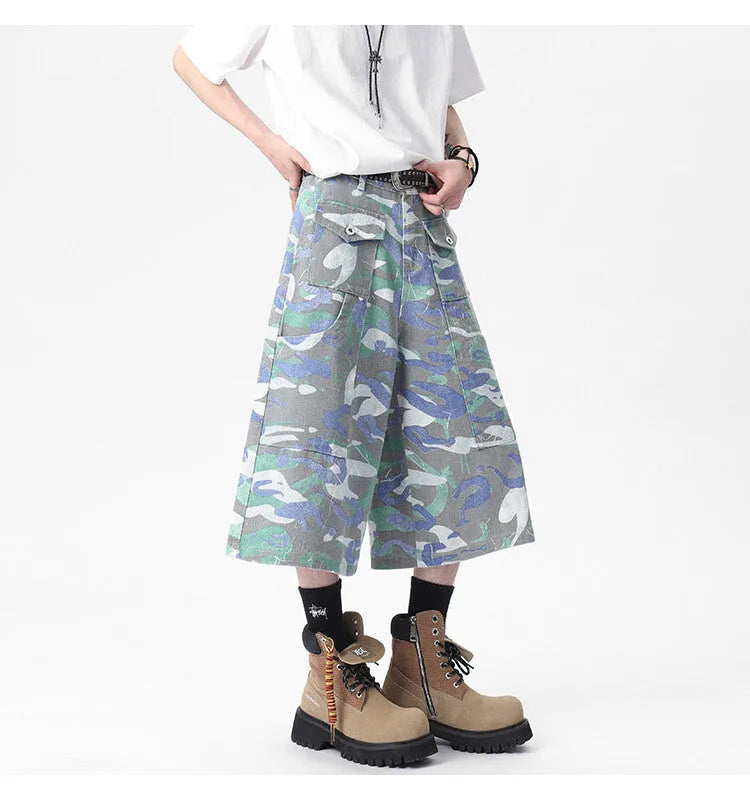 Denim camouflage cropped workwear trousers with straight leg cut and zipper fly closure