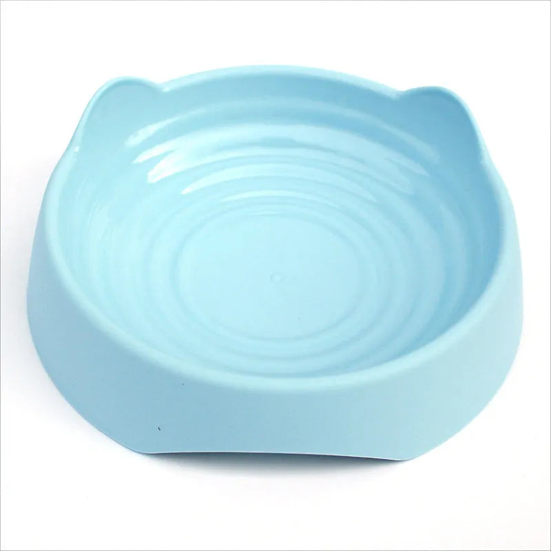Ceramic dog slow feeder bowl in pink colour showing maze pattern with raised ridges