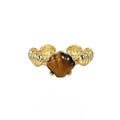 Adjustable silver ring with shell decoration and tiger eye stone on adjustable band