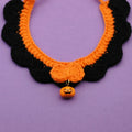 Hand-crocheted wool pet collar with pumpkin design in adjustable sizes
