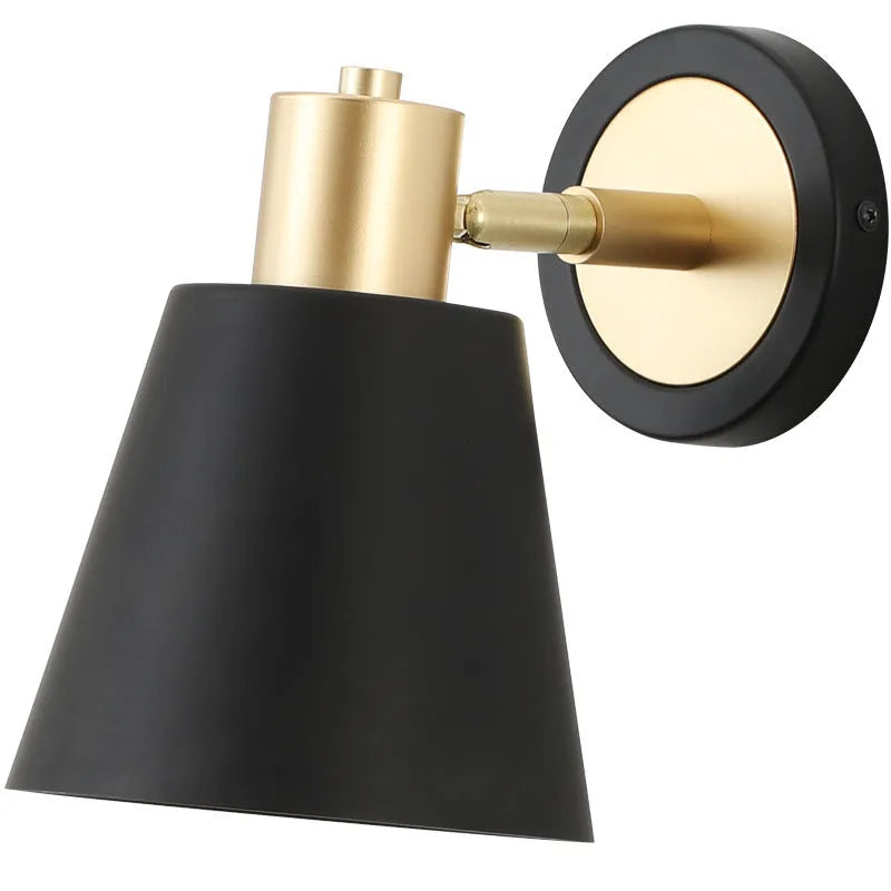 Nordic style iron wall lamp mounted beside a bed, showcasing its metal construction and adjustable light settings.