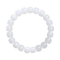 White Hetian jade barrel bead bracelet for men and women on a neutral background.