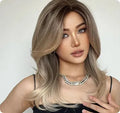 Mid-length platinum gradient curly synthetic wig with long bangs in Star Fashion style.