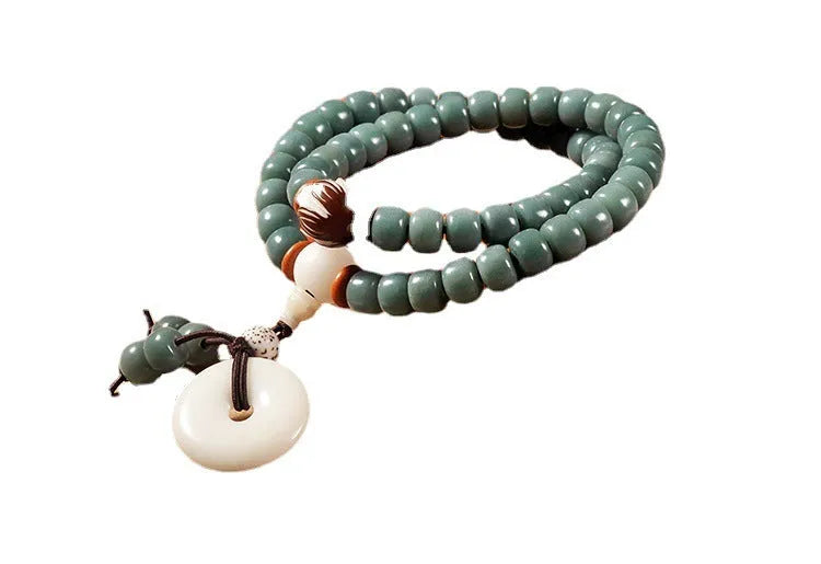 White Jade and green Sandalwood Bodhi seed bracelet with double ring safety buckle and Lotus design