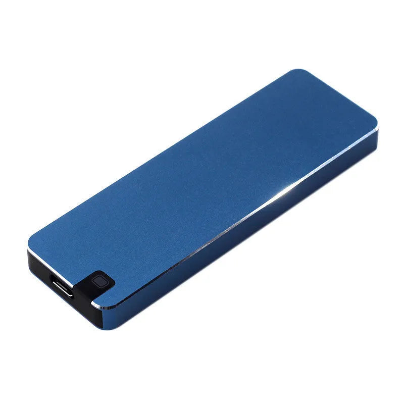 Compact silver portable solid state hard drive with USB cable on a dark surface