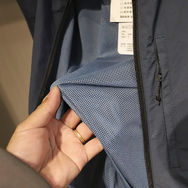Men's straight-cut nylon vest in army green with side seam pockets and bandage-style detailing.