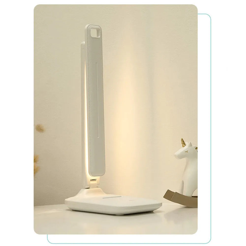 White USB rechargeable bedside lamp with touch dimming controls for children's bedrooms