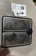 Leather foot massage cushion with remote control and LCD screen showing massage modes