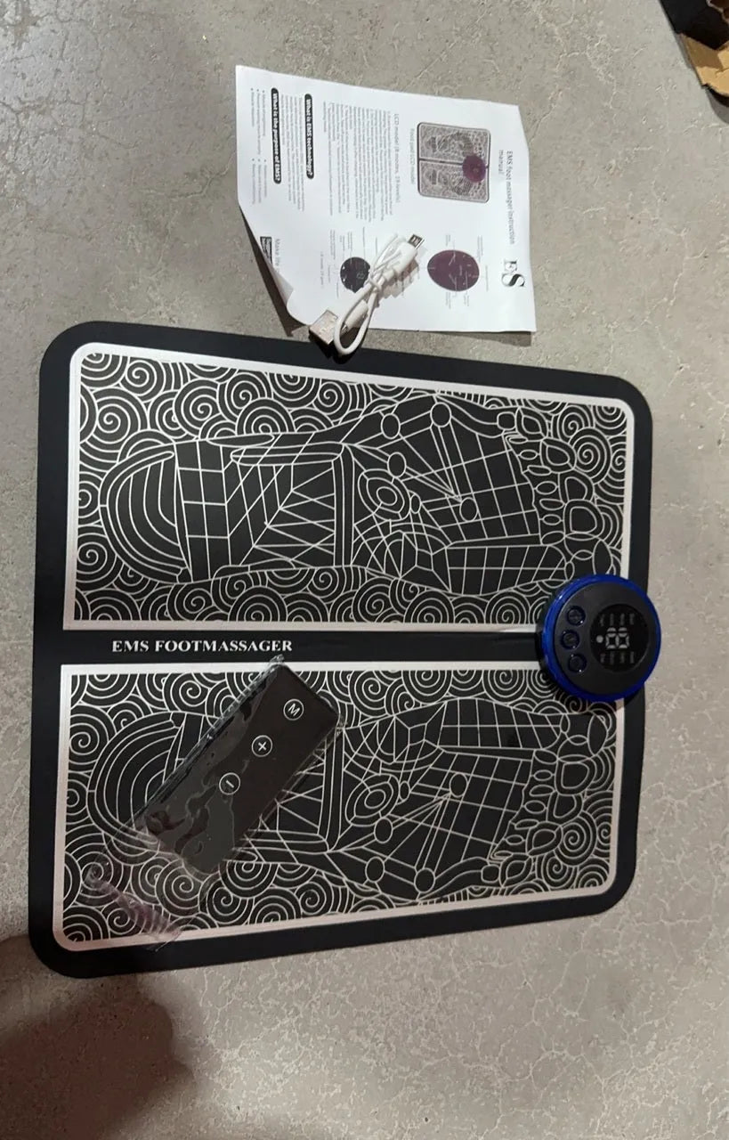 Leather foot massage cushion with remote control and LCD screen showing massage modes