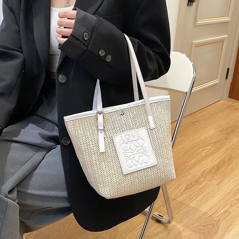Straw woven women's shoulder bag in European retro style with three-dimensional pocket