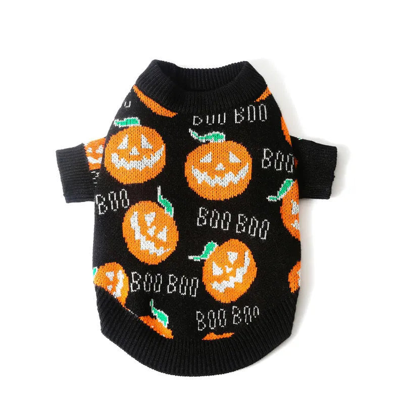 Black dog sweater with a large orange Halloween pumpkin print on the back.