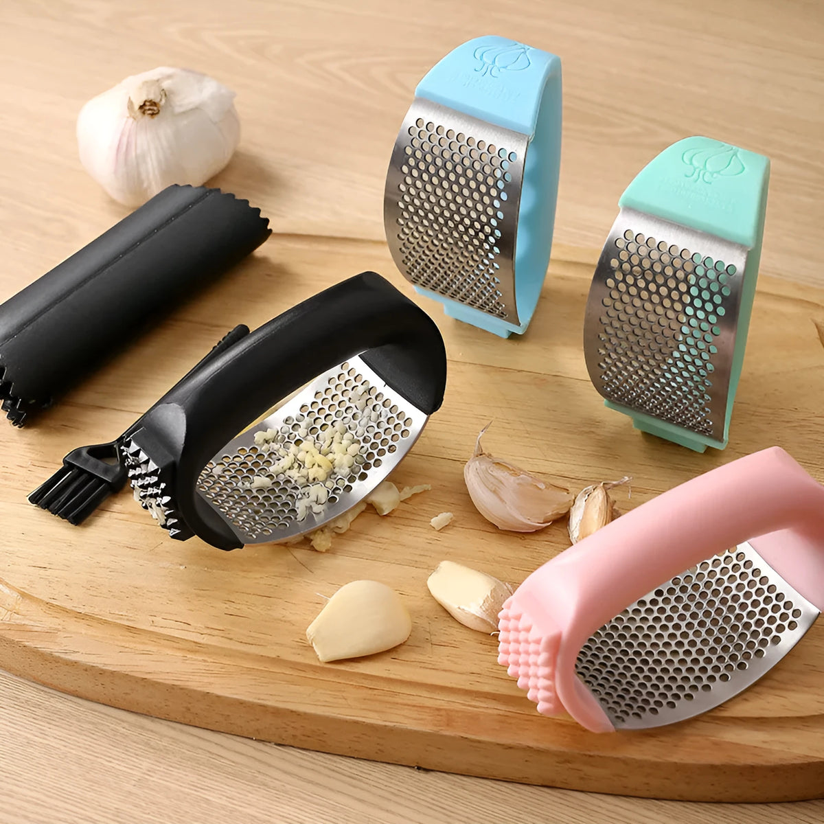 Stainless steel garlic press with modern design in choice of four colours for kitchen use