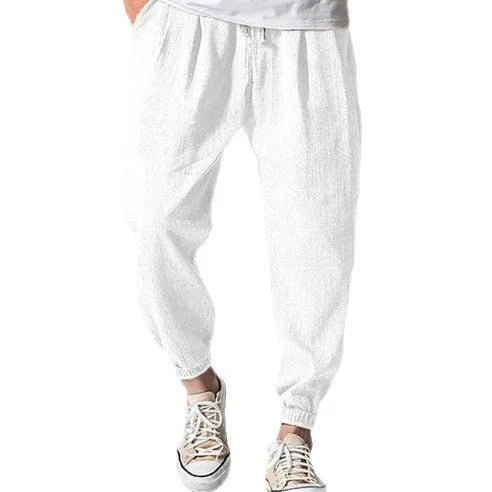Men's loose cotton casual trousers with elasticated ankle bands in light green
