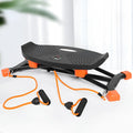 Black mini fitness skiing machine with elastic hand straps showing compact 77cm length design