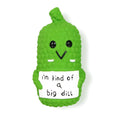 Green latex pickle shaped dog toy with textured surface and squeaker for teething puppies