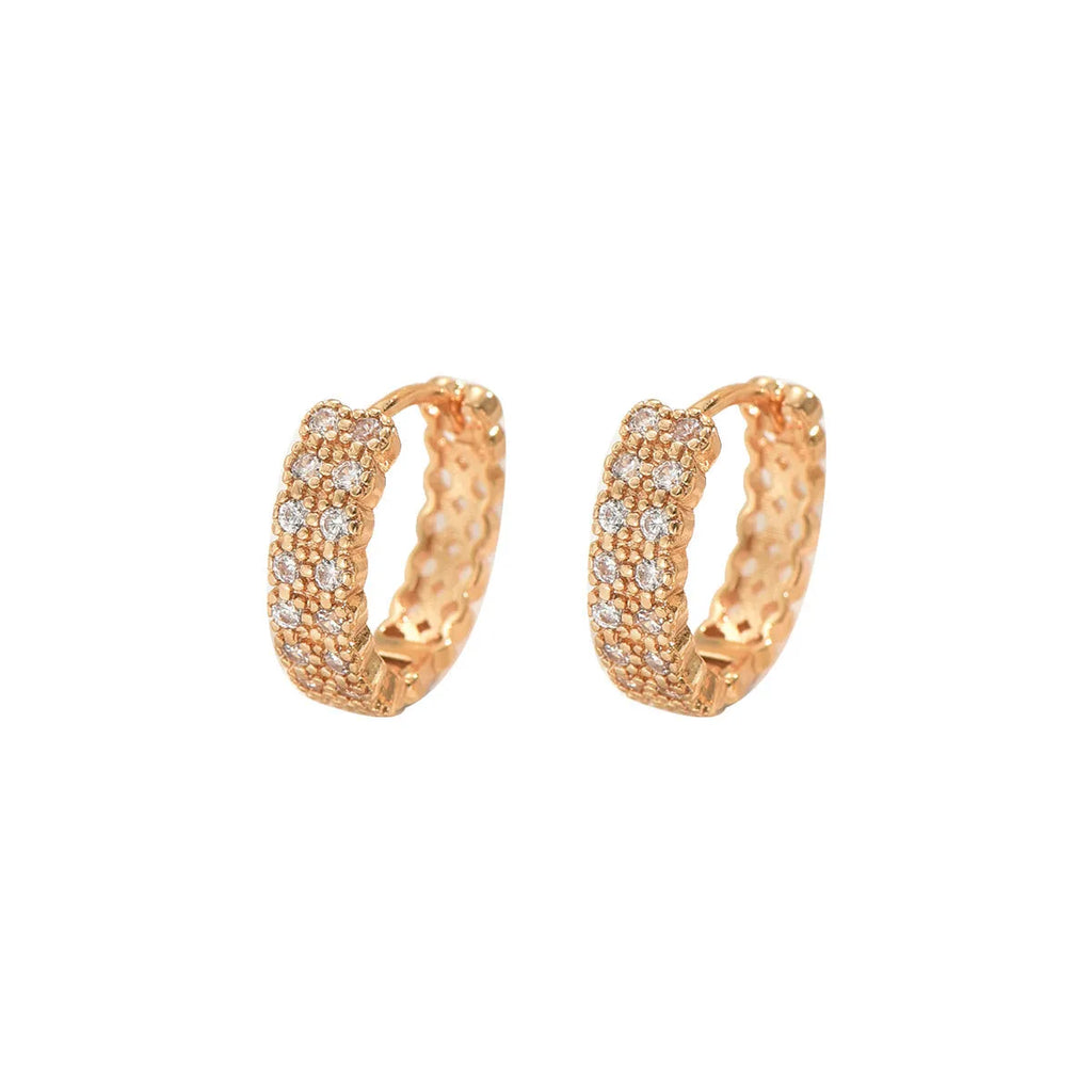 Geometric copper ear studs with circular dot and ring patterns in colour DE20288