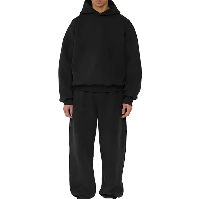 Man wearing a solid colour fleece-lined cotton pullover hoodie with a wool lining.