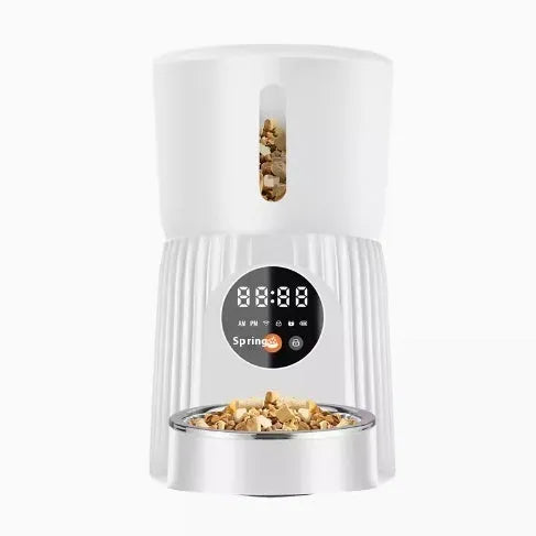 Black and white automatic pet feeder with food storage hopper and USB power connection