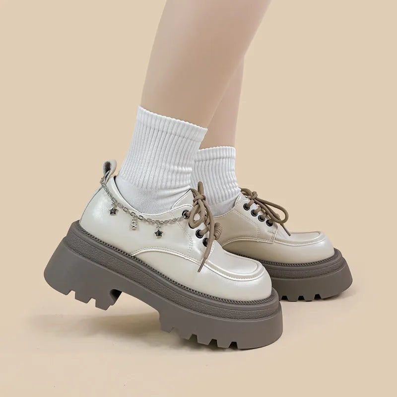White women's Mary Jane platform shoes with round toe, lace-up front, and thick 6-8cm heel