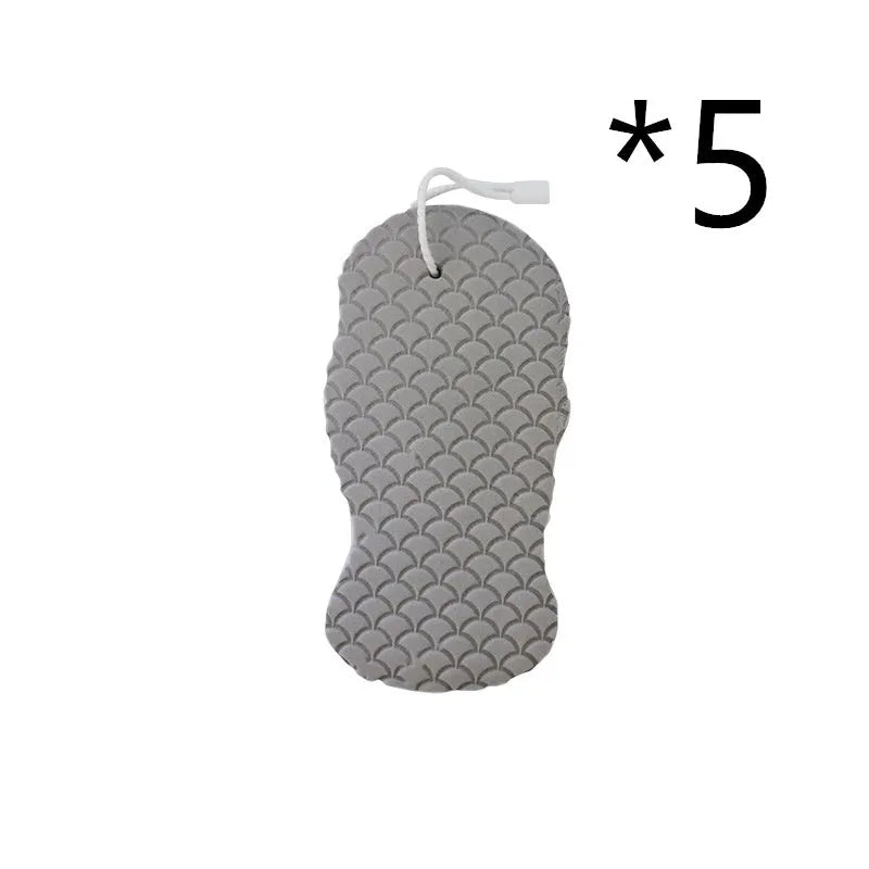 White 3D fish scale pattern bath sponge ball with hanging loop on a grey background.
