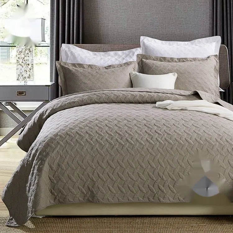 Pure cotton bedding set with damascus pattern showing embroidery details and quilted finish on bed