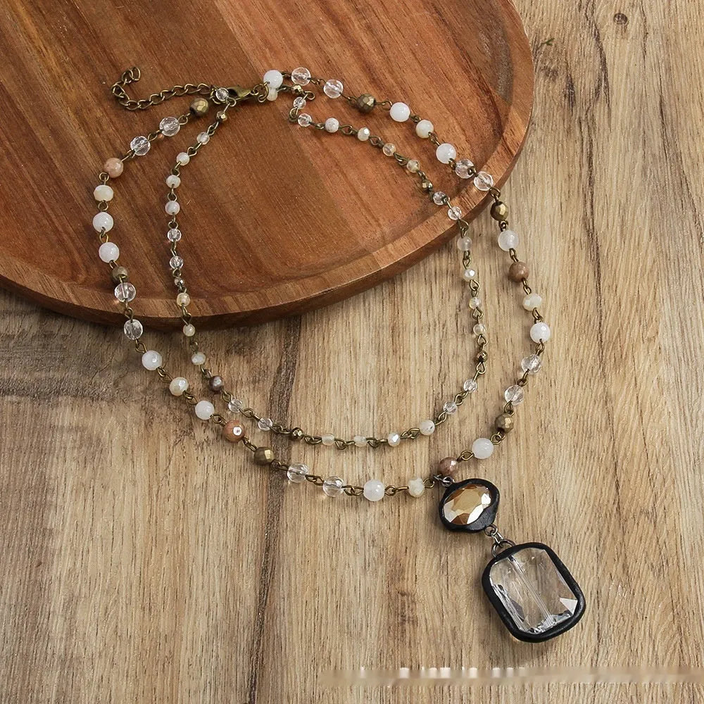 Two-layer tribal necklace with glass pendant and adjustable 31-40cm chain in beige colour