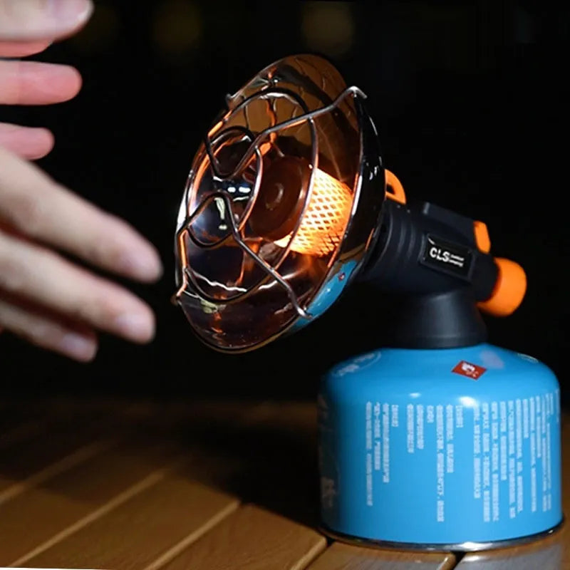 Black and orange portable camping heating stove with automatic ignition, stainless steel construction