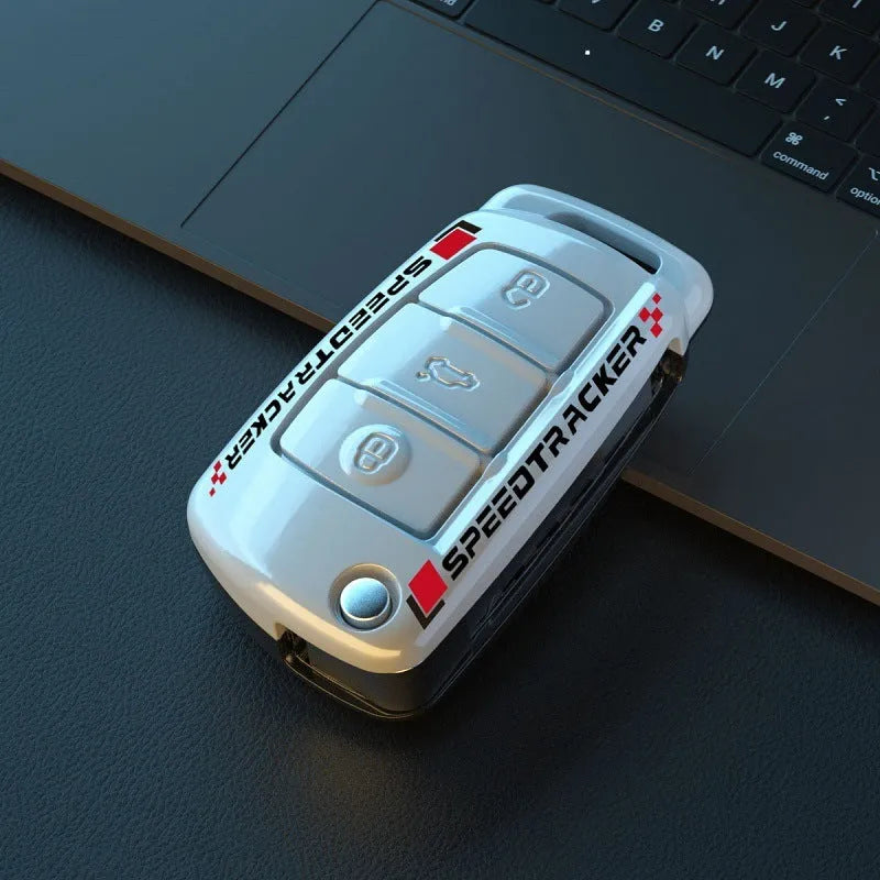 Carbon fibre style car key cover with mirror element in carbon black and white colours