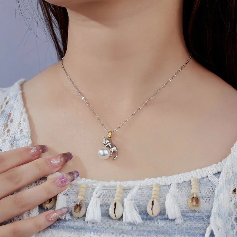 925 sterling silver clavicle chain necklace with a cat charm and electroplated finish.