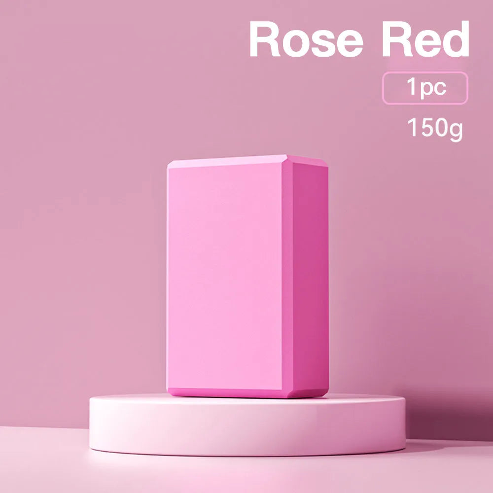 EVA foam yoga blocks in four colours showing hexagonal facets and ridge grip details