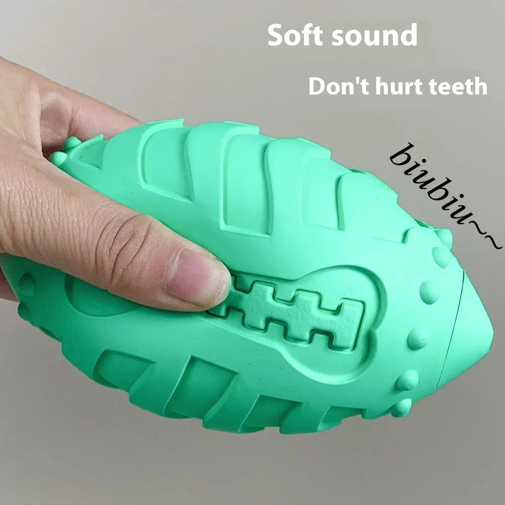 Light green rubber rugby ball dog toy with vocal element for interactive training and teeth cleaning