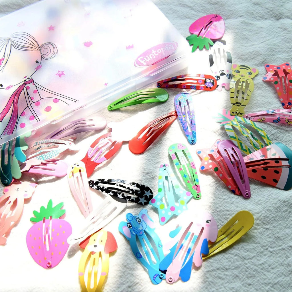 100-piece assortment of candy-colour hair clips with animal, fruit, crown, and star designs featuring metal snap fastenings