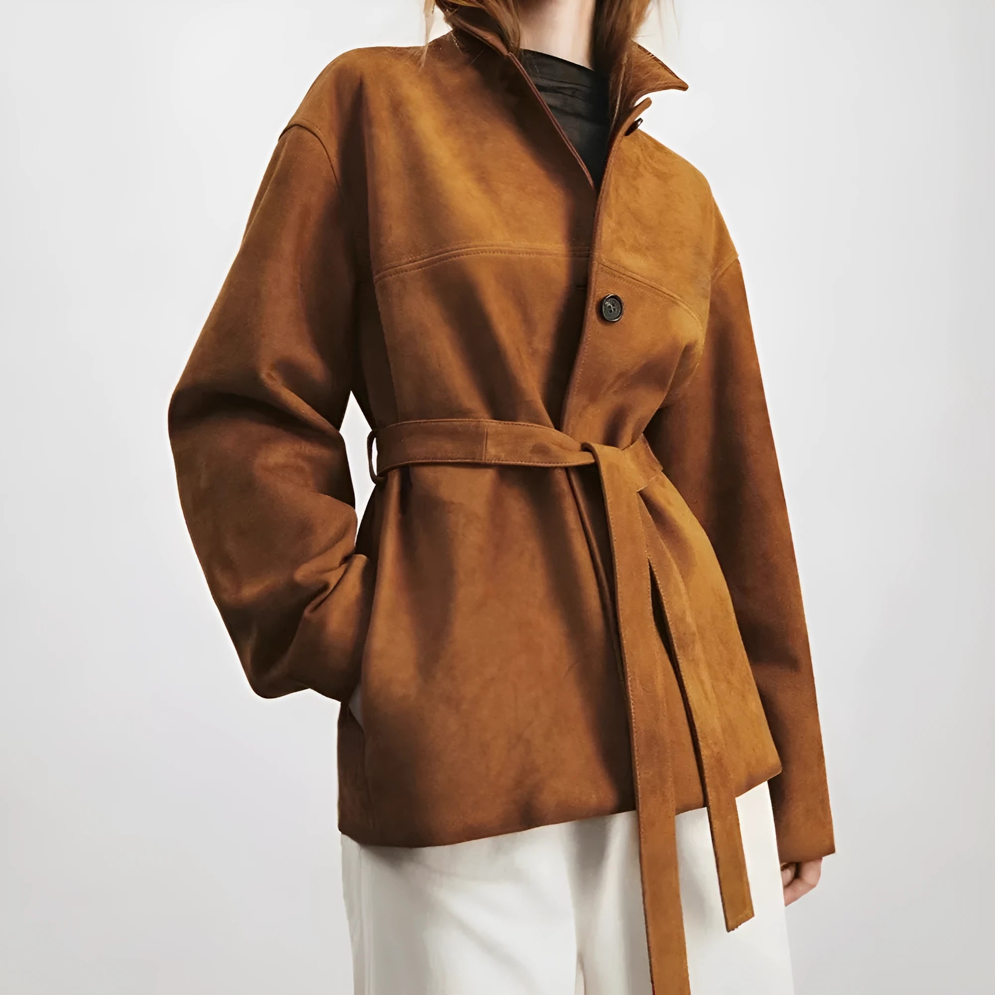 Mid-length yellow brown cashmere coat with leather stitching and Peter Pan collar