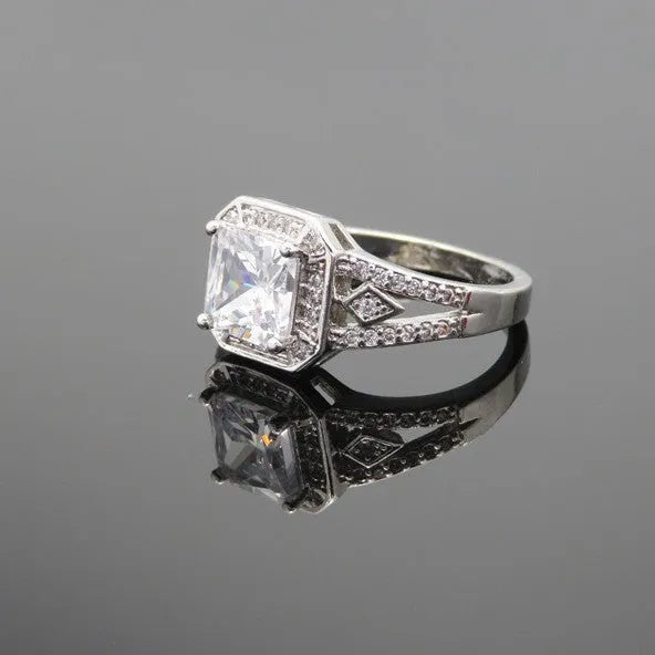 Platinum colour geometric women's ring with hollow design and inlaid zircon stones