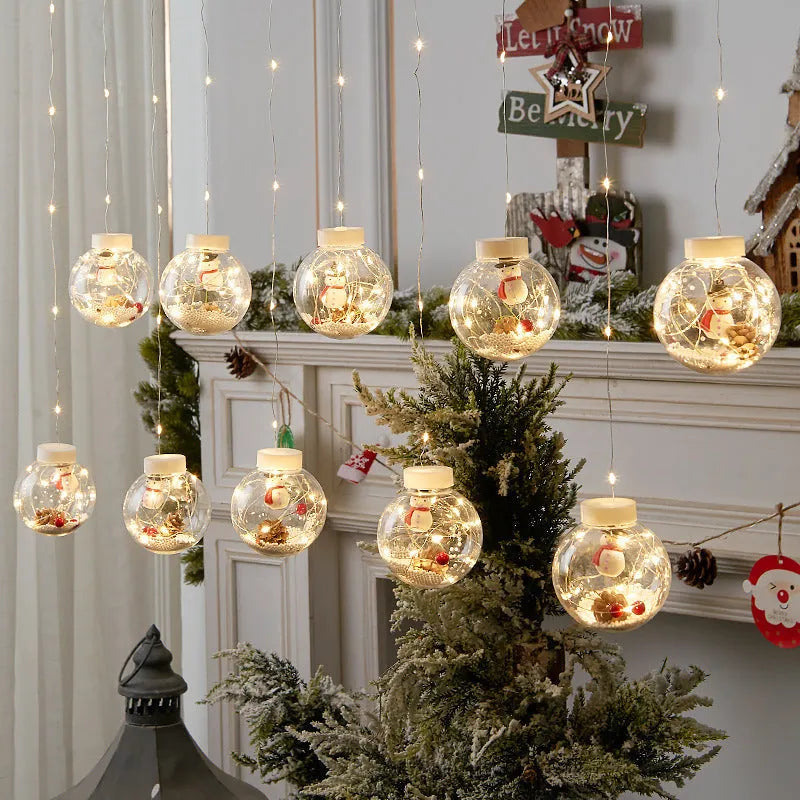10-piece LED Christmas curtain light string with snowman, elder, and Christmas tree wishing ball designs.