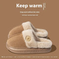 Plush fleece indoor slipper with PVC sole shown in available colours: black, blue, brown, khaki, pink.