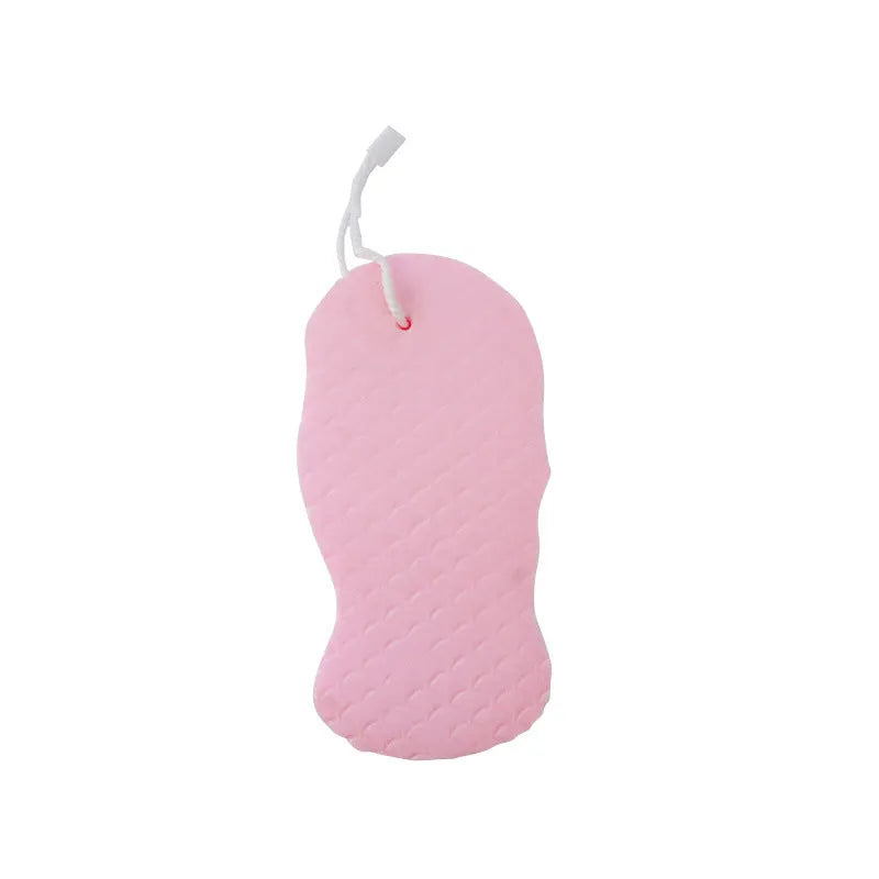 White 3D fish scale pattern bath sponge ball with hanging loop on a grey background.