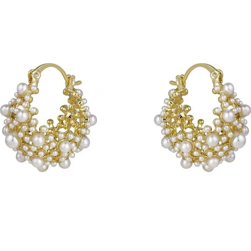 Gold copper flower basket earrings with small rice-shaped beads and pearl inlay detail