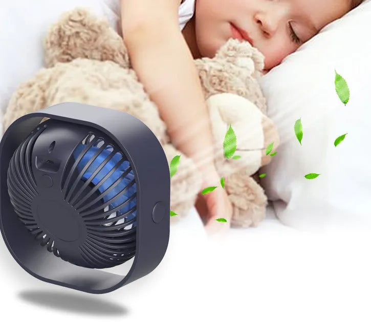 USB-powered alarm clock style desk fan with rotating head in blue, pink, white, or green.
