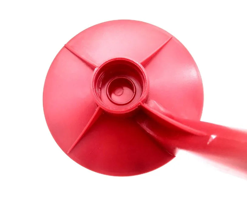 Red plastic Magic Tap soda bottle dispenser with push-button tap for 2-litre bottles.